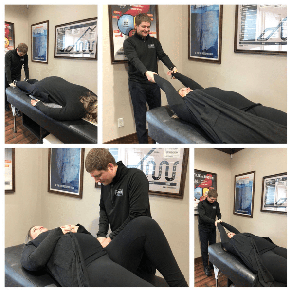 Chiropractor West Des Moines IA Sean Ellingworth Adjusting Patient