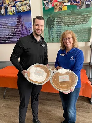 Chiropractor West Des Moines IA Josiah Fitzsimmons Handing Out Pies